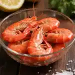Argentine Red Shrimp Taste with raw ruby-red shrimp in a glass bowl